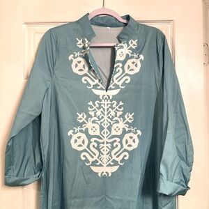 Beautiful turquoise bathing suit cover up.